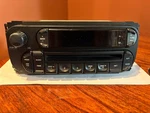 Genuine Dodge Daimler Chrysler Jeep Cd Player Radio Stereo P05091506ad Oem. Fixed Price $49.00.